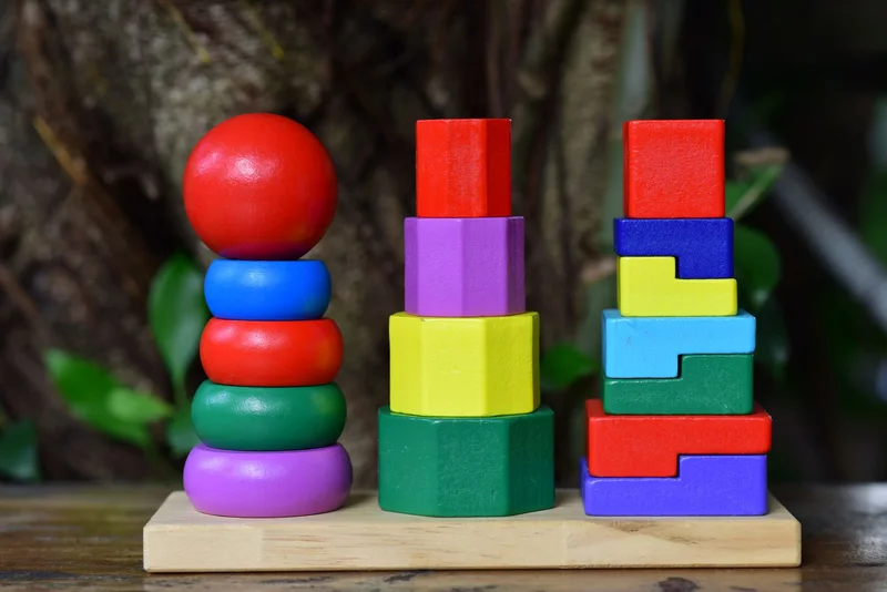 A colourful wooden stacking toy set